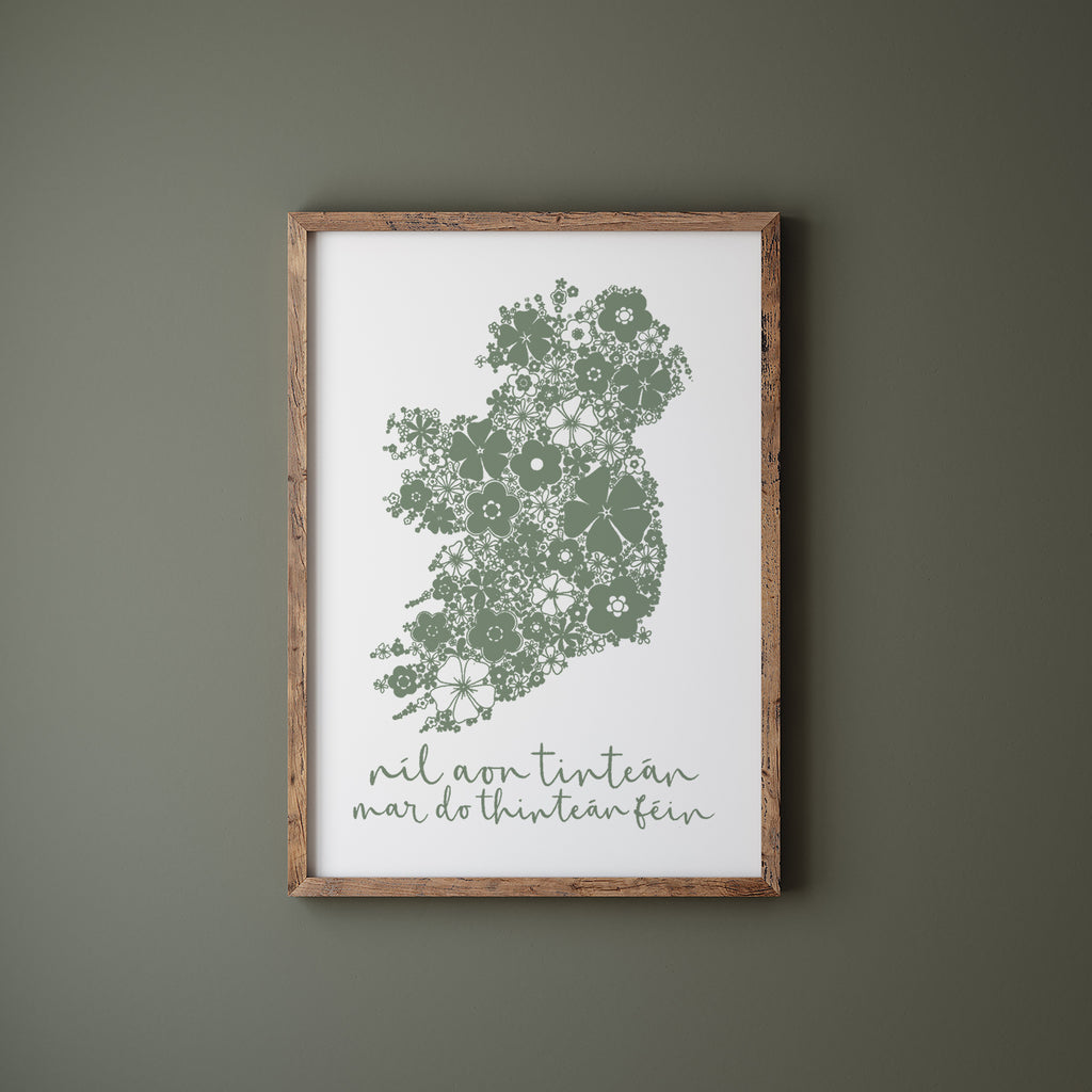 Green Irish screen print with Ireland in a wood frame hanging on a green wall