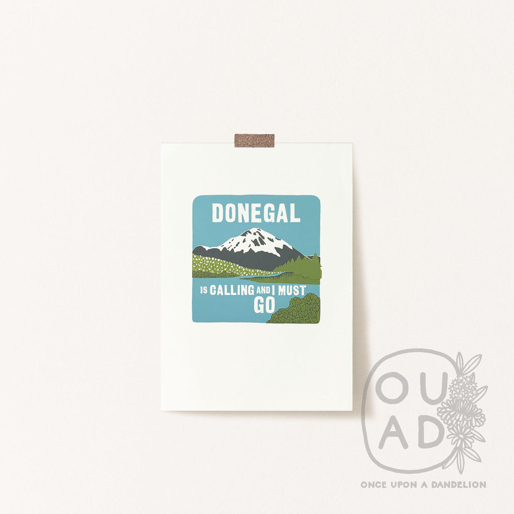 Our 'Donegal is calling and I must go' three colour screen print, blue, green and grey, taped to a wall.