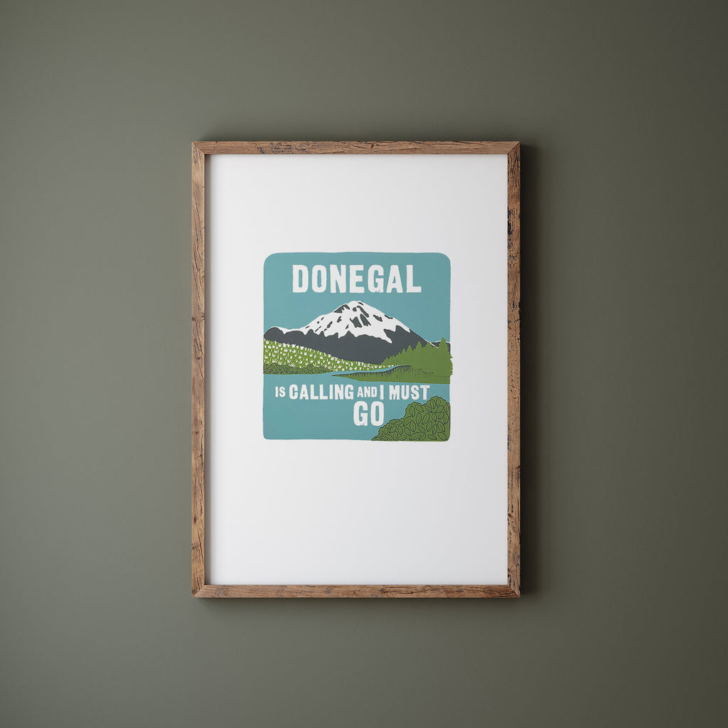 Donegal screen print in a wood frame hanging on a green wall