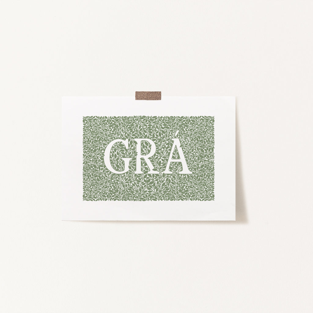 Our green Grá screen print taped to a wall.