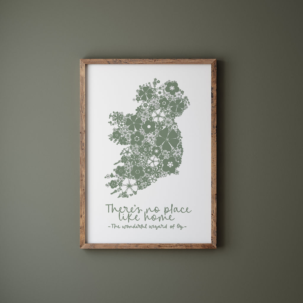 Green Ireland screen print in a wood frame hanging on a green wall