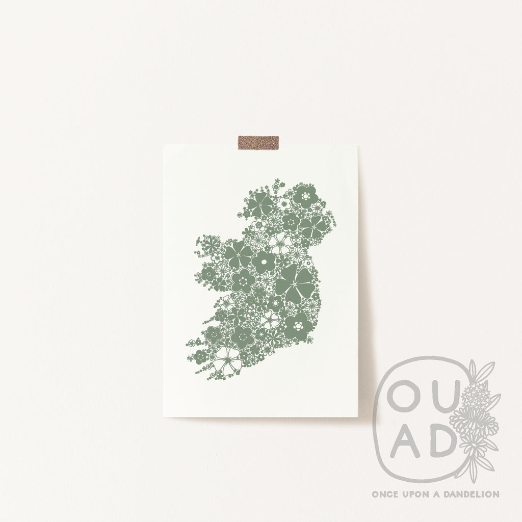 Green floral Ireland screen print stuck to the wall with tape