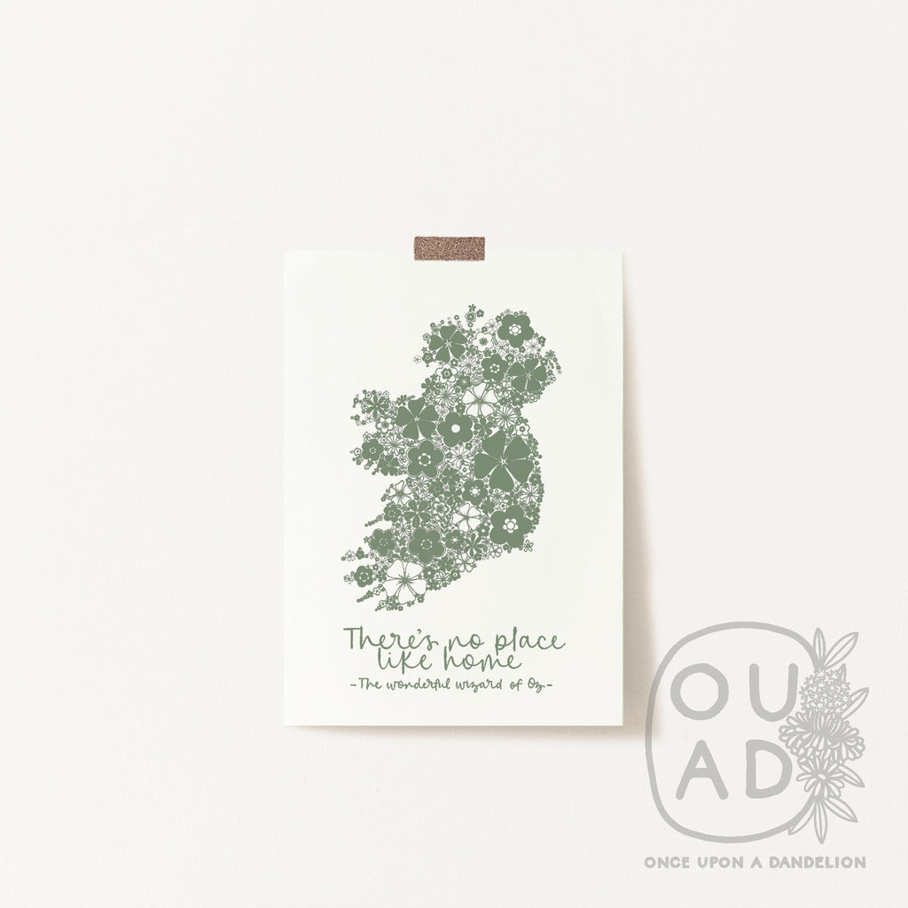 Green floral Ireland screen print taped to a wall